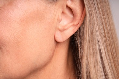Photo of Closeup view of woman with healthy skin
