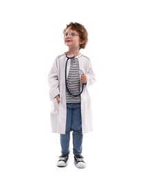 Photo of Choice of profession. Little boy with stethoscope pretending to be doctor on white background
