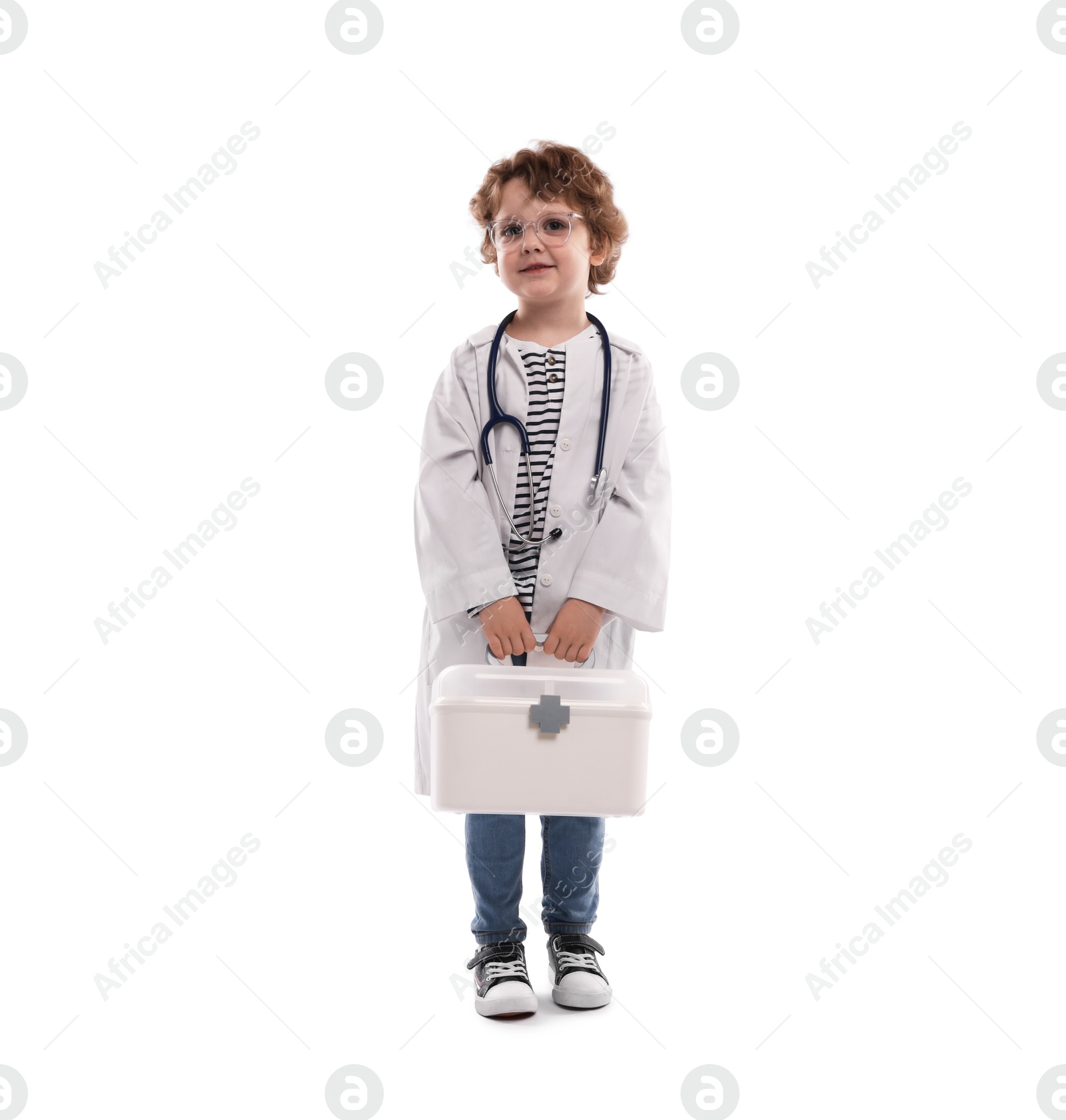Choice of profession. Little boy with stethoscope and first aid kit pretending to be doctor on white background Photo of Choice of profession. Little boy with stethoscope and first aid kit pretending to be doctor on white background