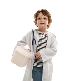 Photo of Choice of profession. Little boy with stethoscope and first aid kit pretending to be doctor on white background