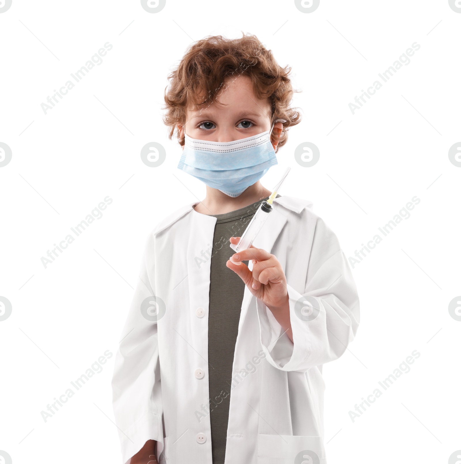 Choice of profession. Little boy in medical mask with syringe pretending to be doctor on white background Photo of Choice of profession. Little boy in medical mask with syringe pretending to be doctor on white background