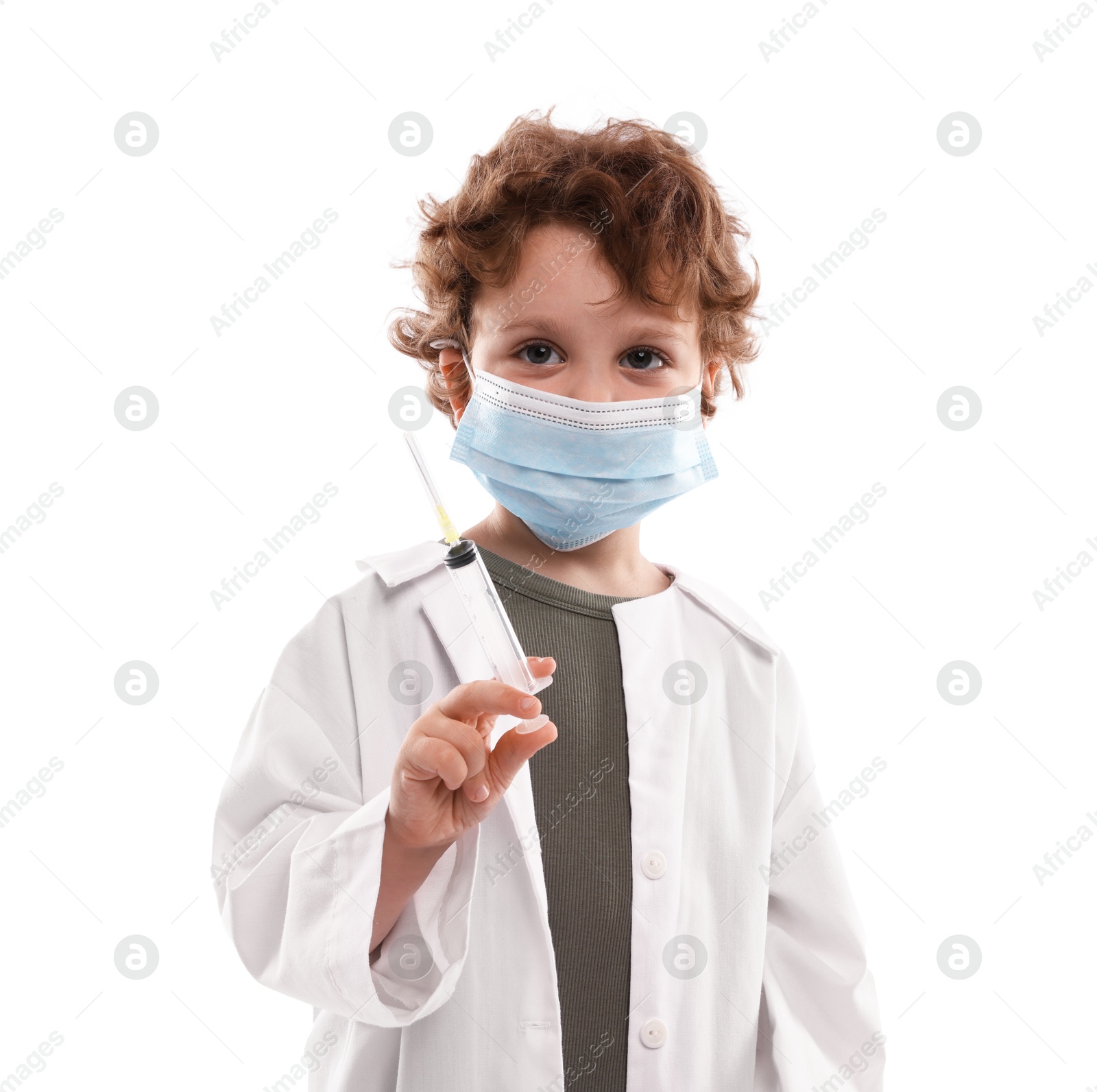 Choice of profession. Little boy in medical mask with syringe pretending to be doctor on white background Photo of Choice of profession. Little boy in medical mask with syringe pretending to be doctor on white background