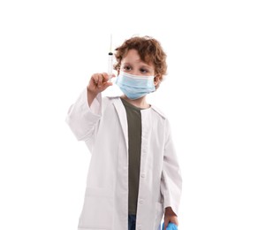 Photo of Choice of profession. Little boy in medical mask with syringe pretending to be doctor on white background
