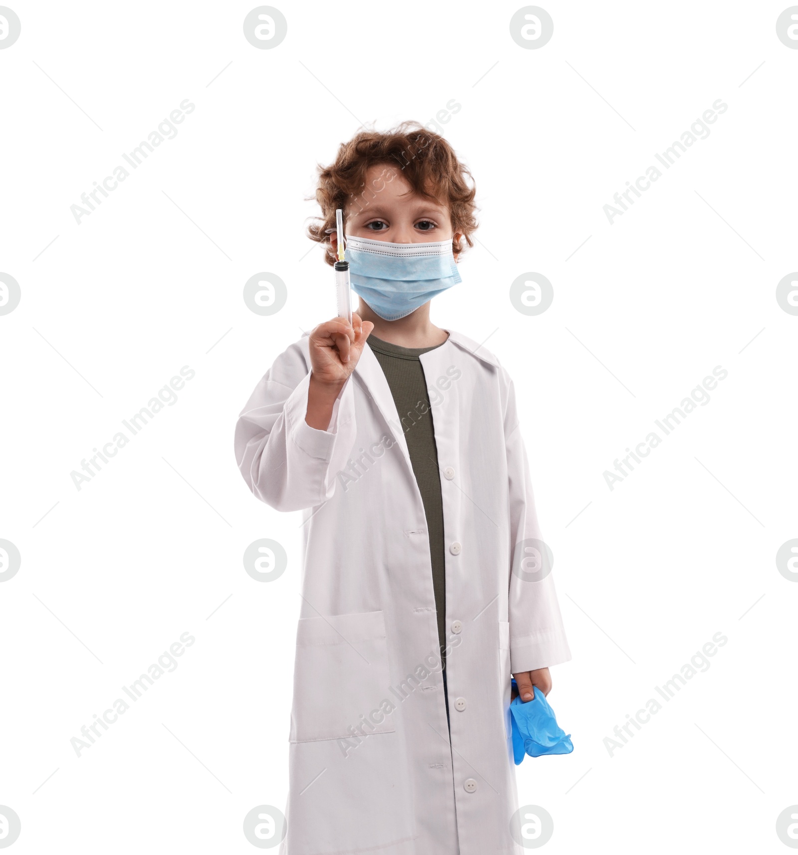Choice of profession. Little boy in medical mask with syringe and glove pretending to be doctor on white background Photo of Choice of profession. Little boy in medical mask with syringe and glove pretending to be doctor on white background