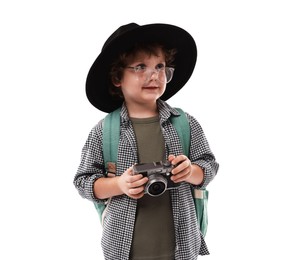Photo of Choice of profession. Little boy in hat with camera pretending to be photographer on white background