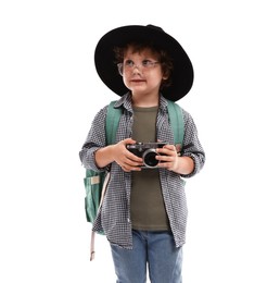 Photo of Choice of profession. Little boy in hat with camera pretending to be photographer on white background