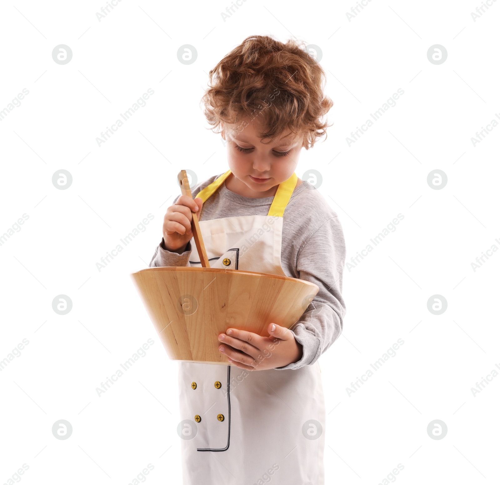 Choice of profession. Little boy with wooden bowl and spoon pretending to be chef on white background Photo of Choice of profession. Little boy with wooden bowl and spoon pretending to be chef on white background