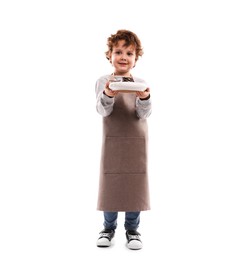 Photo of Choice of profession. Little boy with dessert pretending to be pastry chef on white background