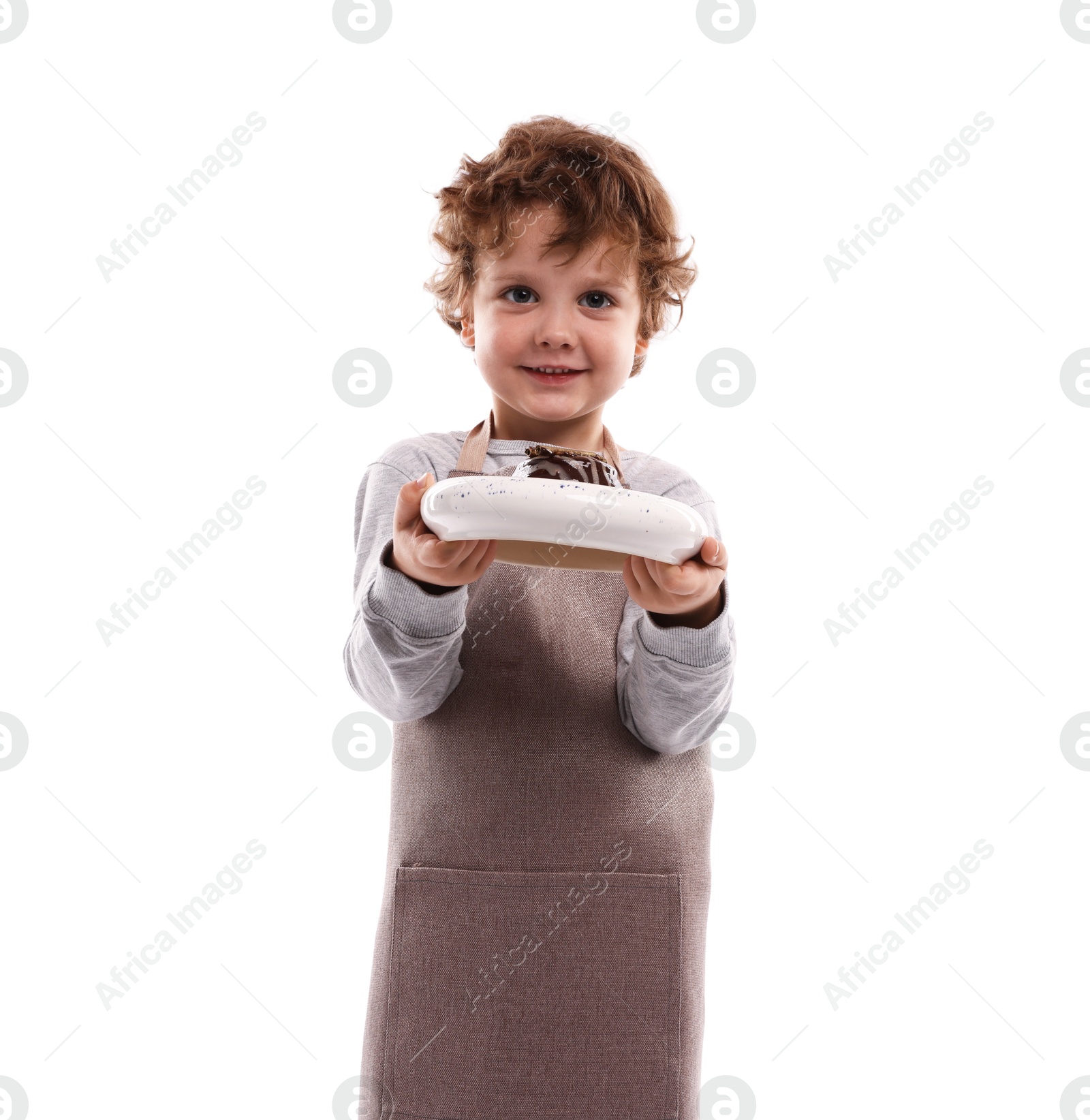 Choice of profession. Little boy with dessert pretending to be pastry chef on white background Photo of Choice of profession. Little boy with dessert pretending to be pastry chef on white background