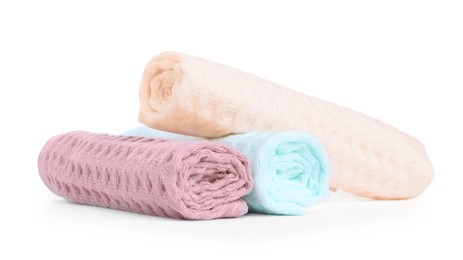 Photo of Soft rolled waffle towels isolated on white