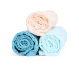 Photo of Soft rolled waffle towels isolated on white