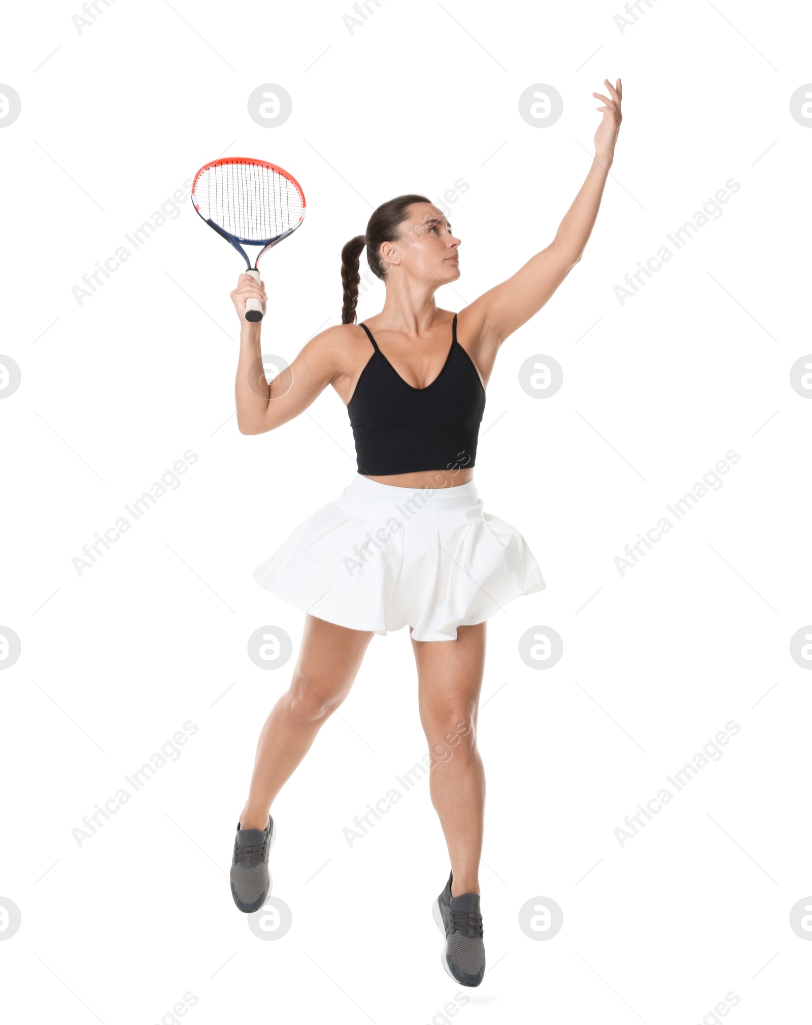 Woman with racket playing tennis on white background Photo of Woman with racket playing tennis on white background
