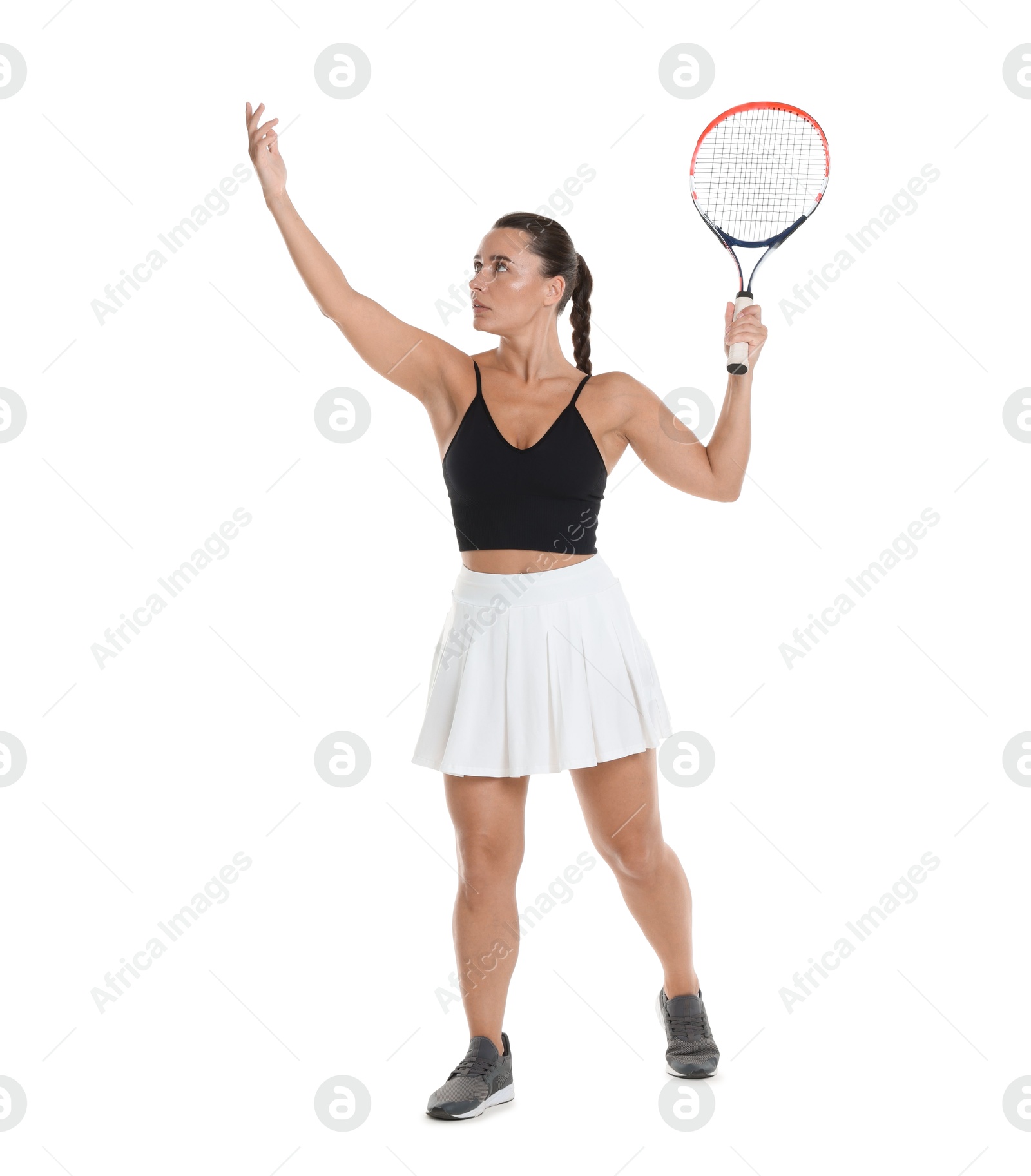 Woman with racket playing tennis on white background Photo of Woman with racket playing tennis on white background