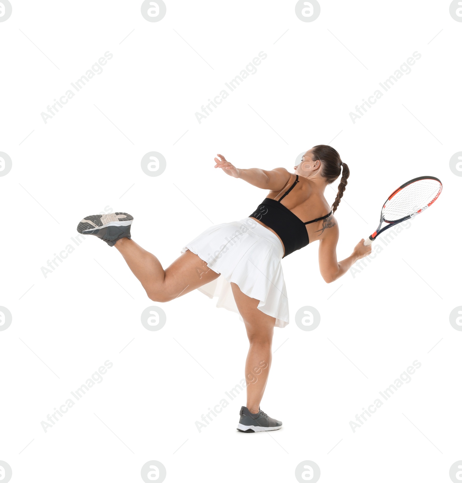 Woman with racket playing tennis on white background Photo of Woman with racket playing tennis on white background