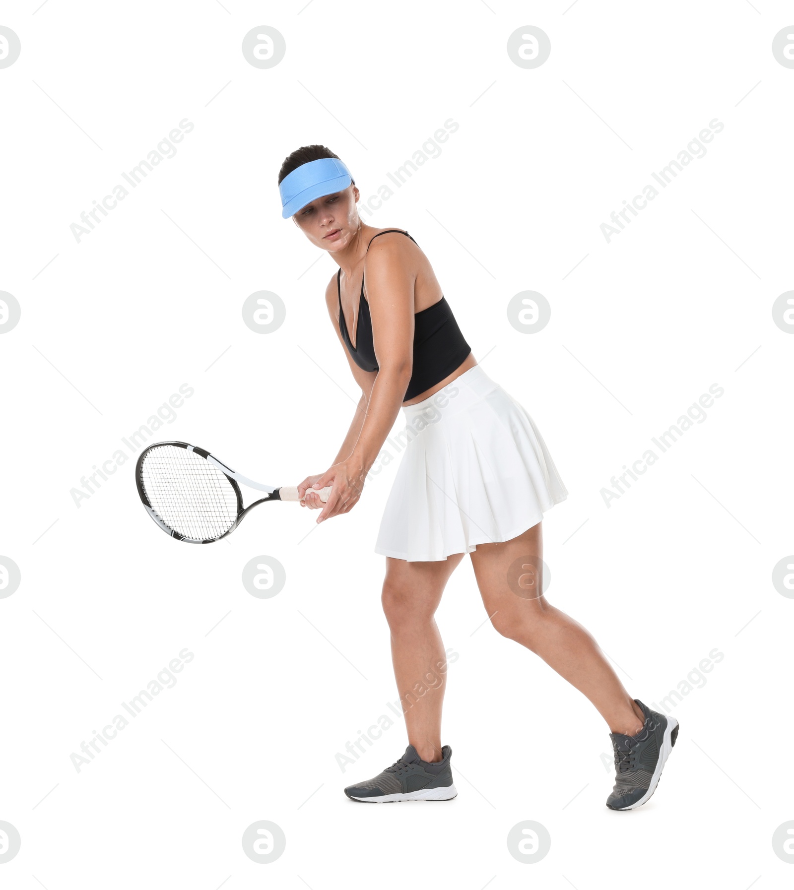 Woman with racket playing tennis on white background Photo of Woman with racket playing tennis on white background