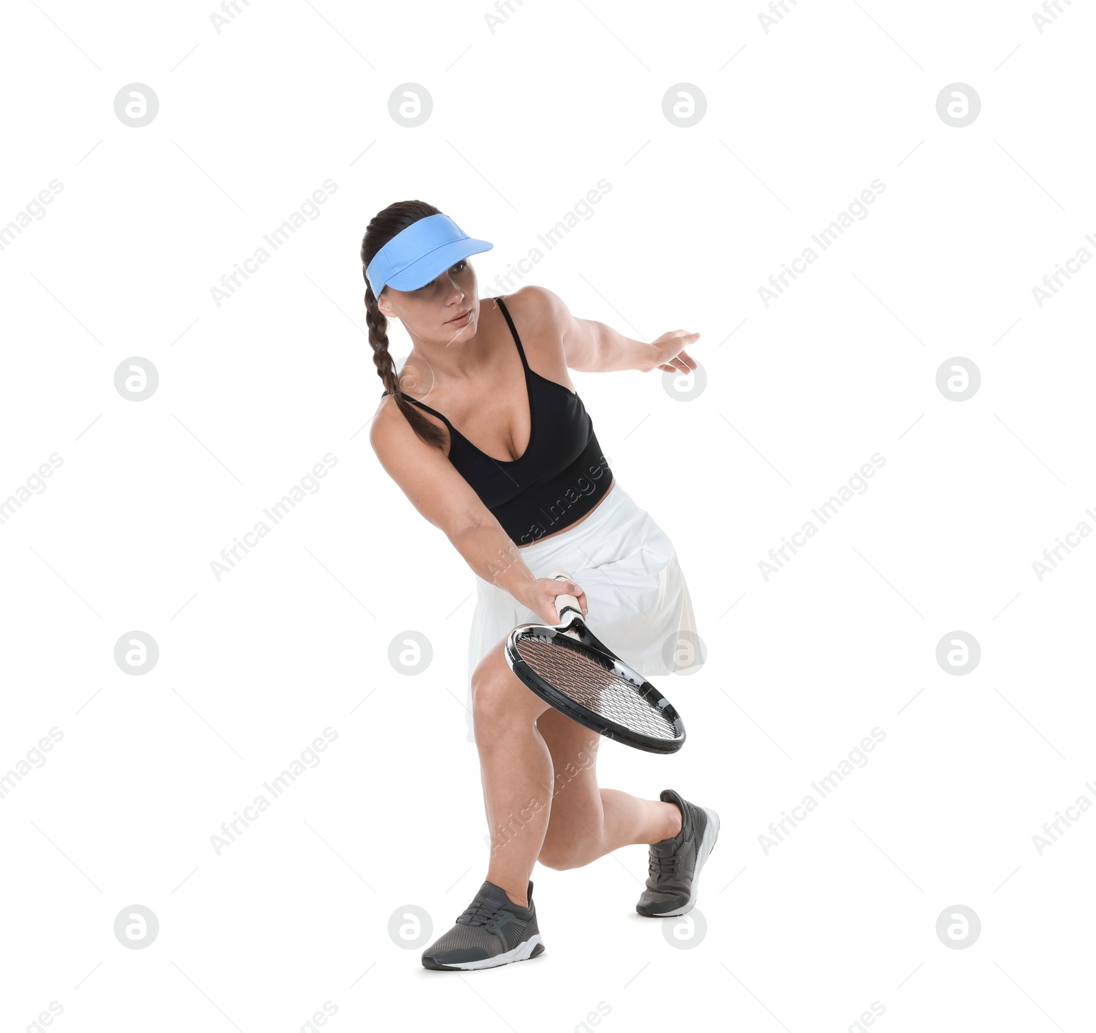 Woman with racket playing tennis on white background Photo of Woman with racket playing tennis on white background