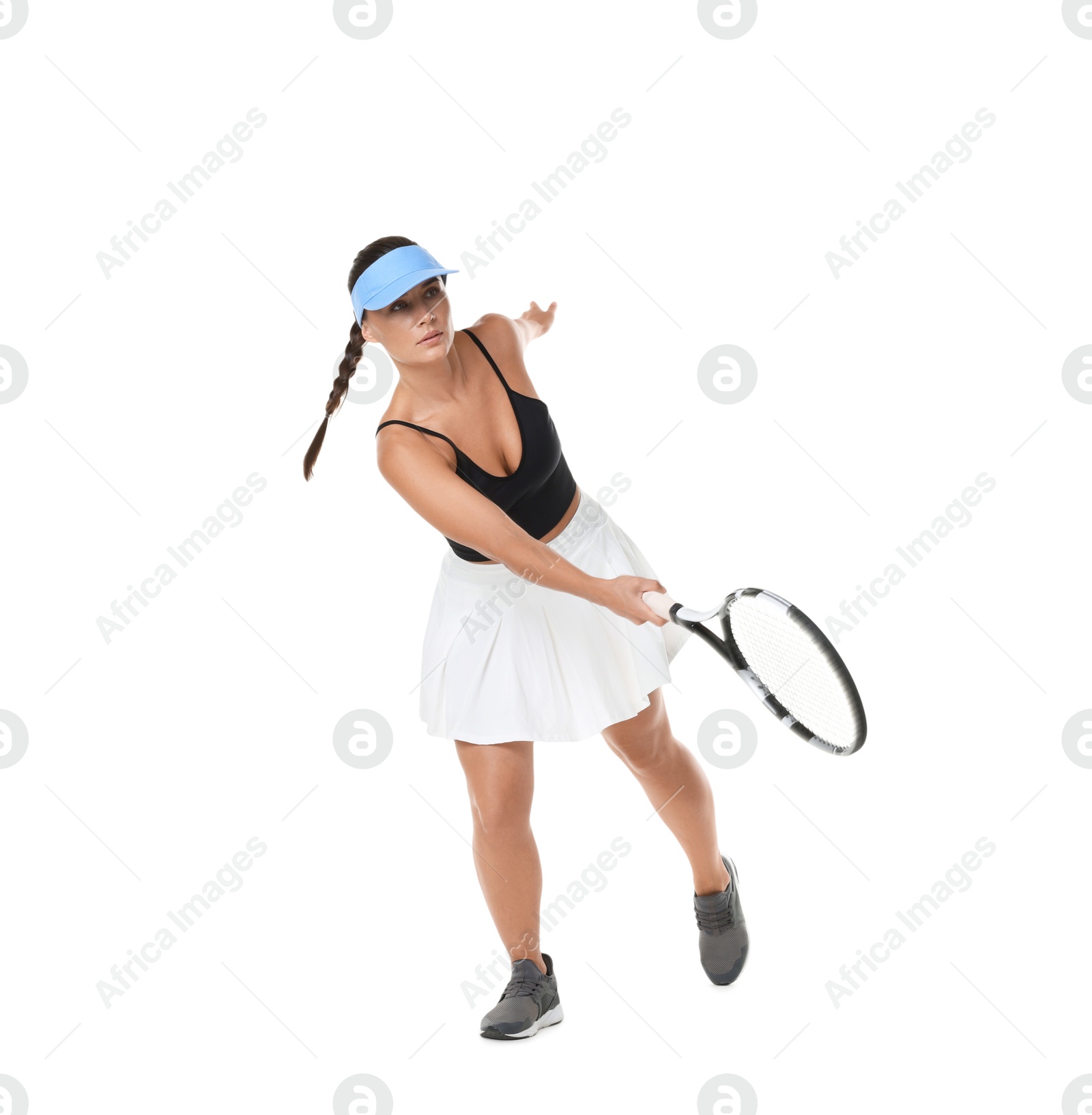 Photo of Woman with racket playing tennis on white background
