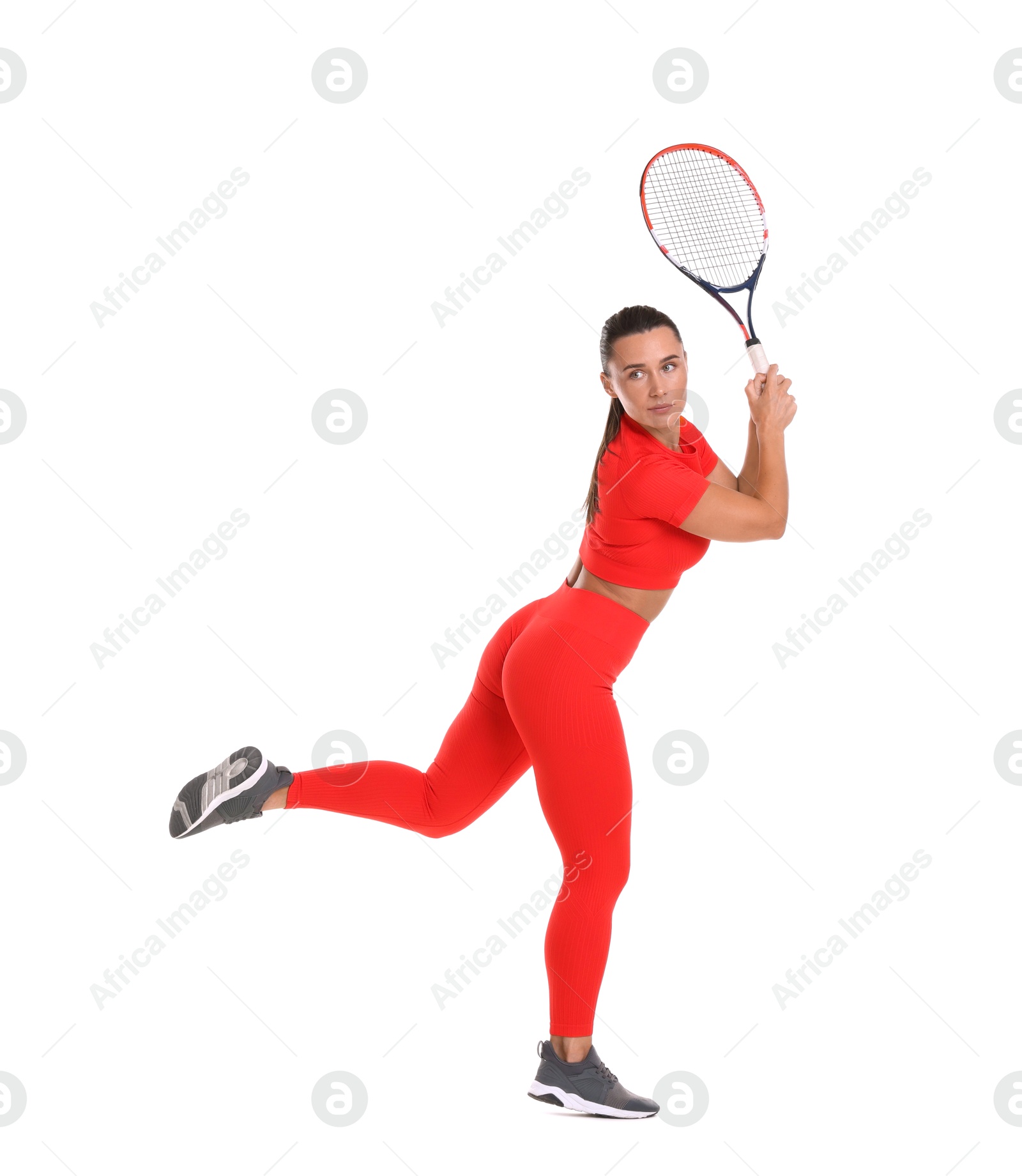 Woman with racket playing tennis on white background Photo of Woman with racket playing tennis on white background