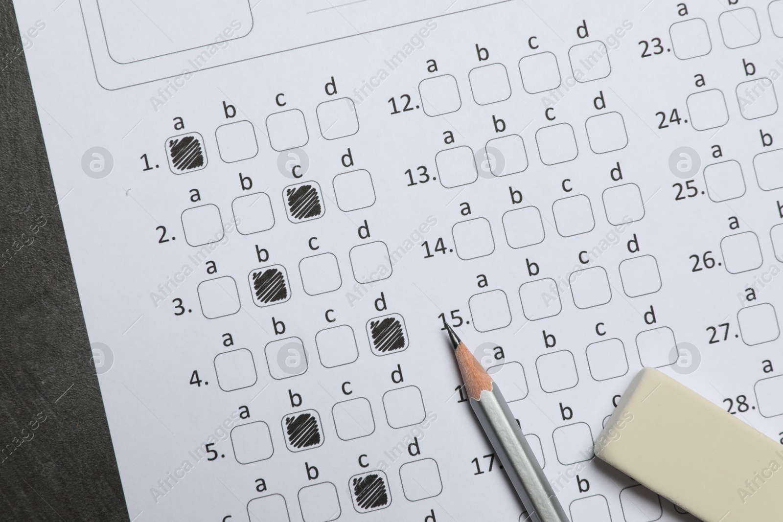 Photo of Answer sheet, pencil and eraser on table, flat lay. Student passing exam