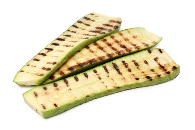 Photo of Delicious grilled courgette slices isolated on white