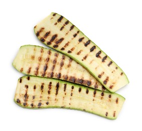 Photo of Delicious grilled courgette slices isolated on white, top view