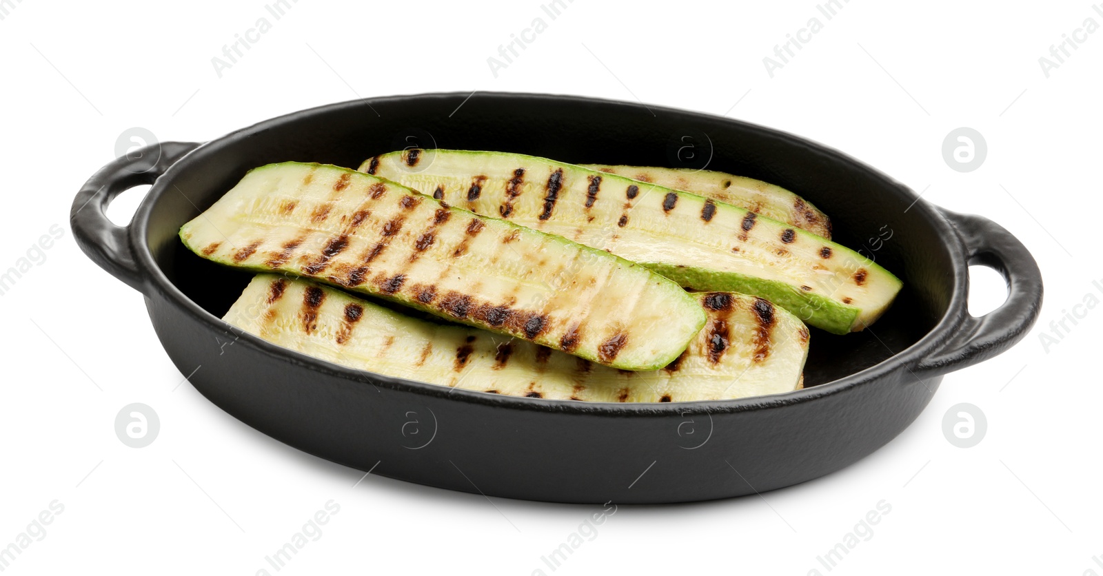 Photo of Delicious grilled courgette slices in baking dish isolated on white