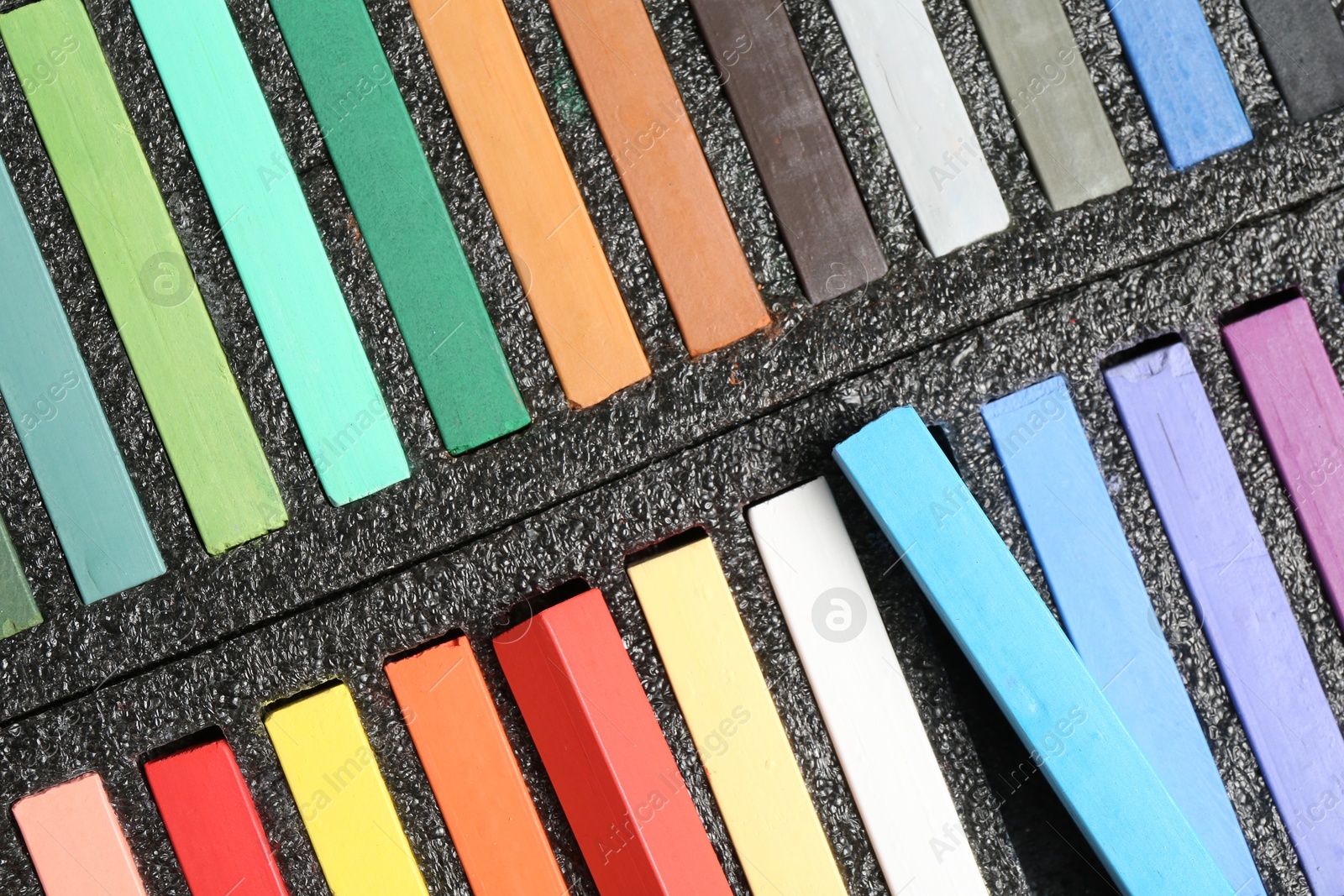 Set of colorful chalk pastels as background, closeup Photo of Set of colorful chalk pastels as background, closeup