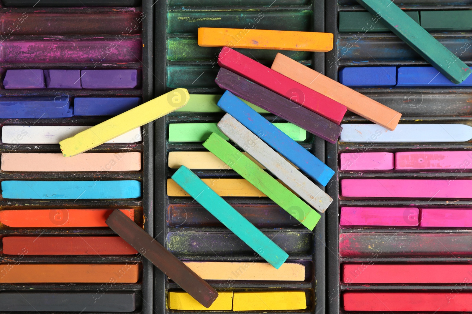 Set of colorful chalk pastels as background, closeup Photo of Set of colorful chalk pastels as background, closeup