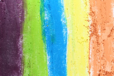 Photo of Scribble of colorful chalk pastels on paper, closeup