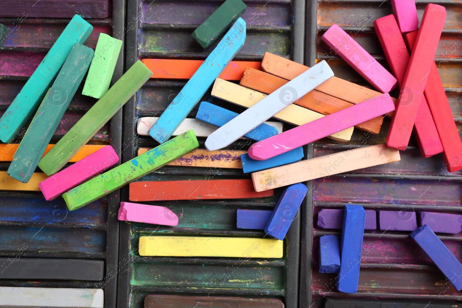Set of colorful chalk pastels as background, closeup Photo of Set of colorful chalk pastels as background, closeup