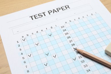 Photo of Answer sheet and pencil on table, closeup. Student passing exam