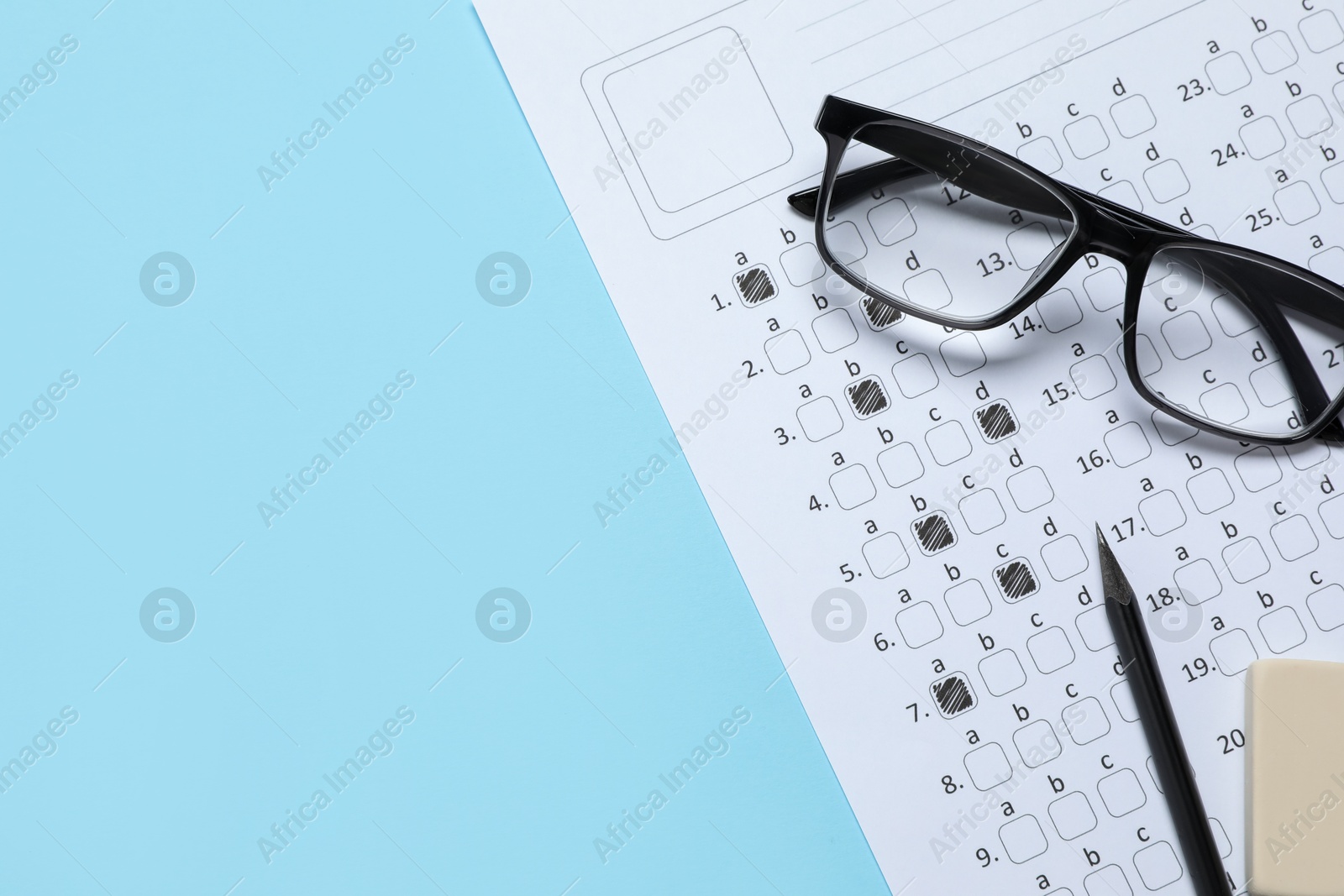 Student passing exam. Answer sheet, glasses, pencil and eraser on light blue background, flat lay. Space for text Photo of Student passing exam. Answer sheet, glasses, pencil and eraser on light blue background, flat lay. Space for text
