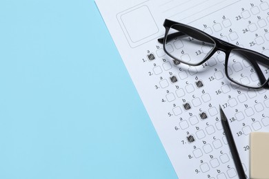 Photo of Student passing exam. Answer sheet, glasses, pencil and eraser on light blue background, flat lay. Space for text