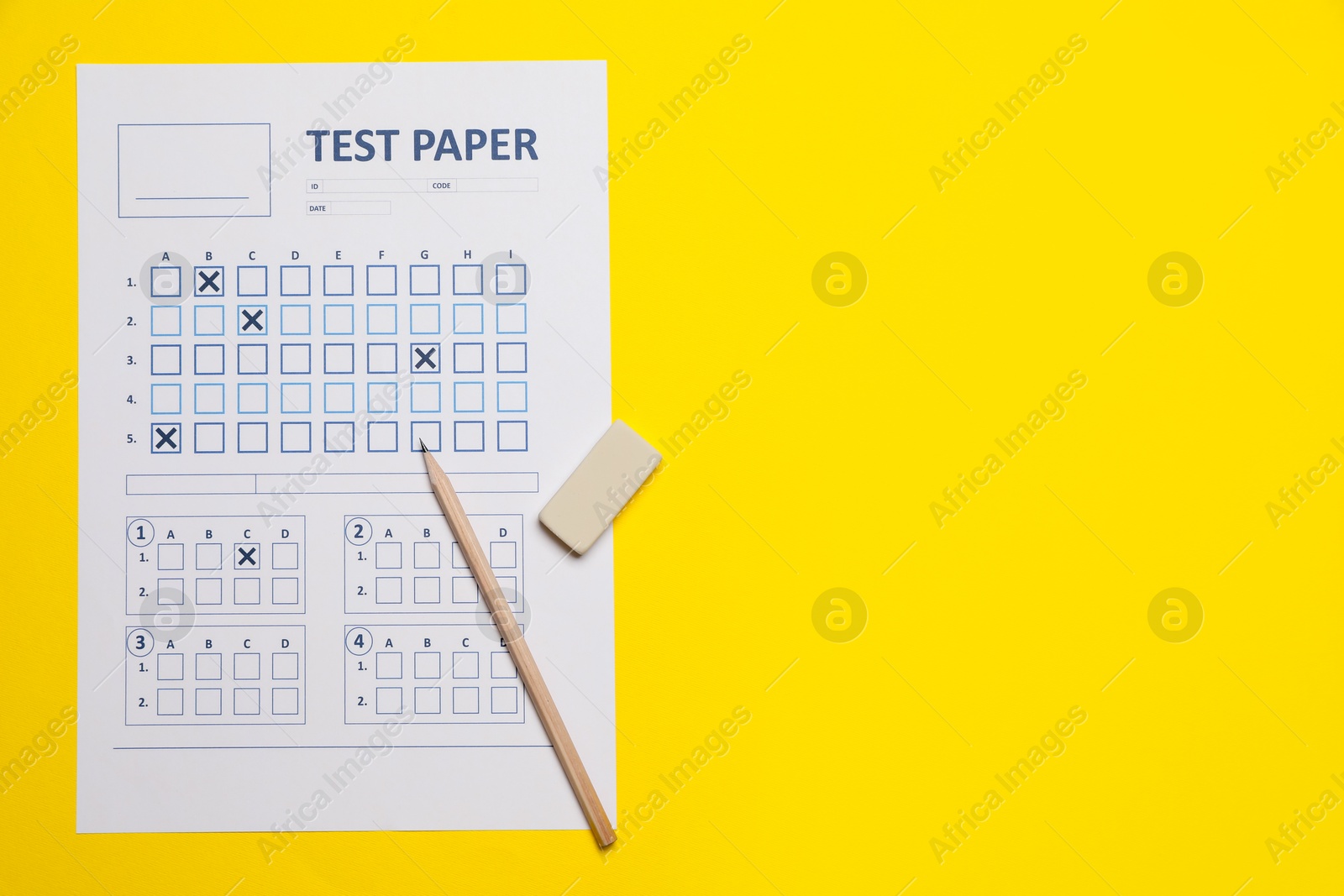 Photo of Student passing exam. Answer sheet, pencil and eraser on yellow background, flat lay. Space for text