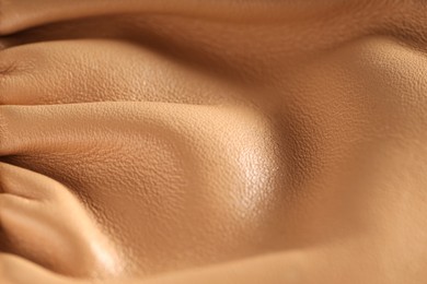 Photo of Texture of natural leather as background, closeup