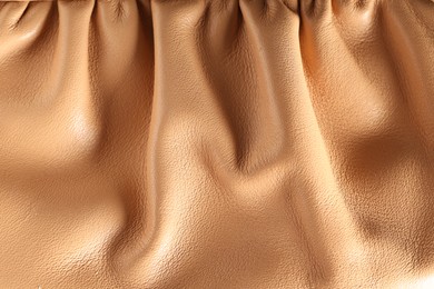Photo of Texture of natural leather as background, top view