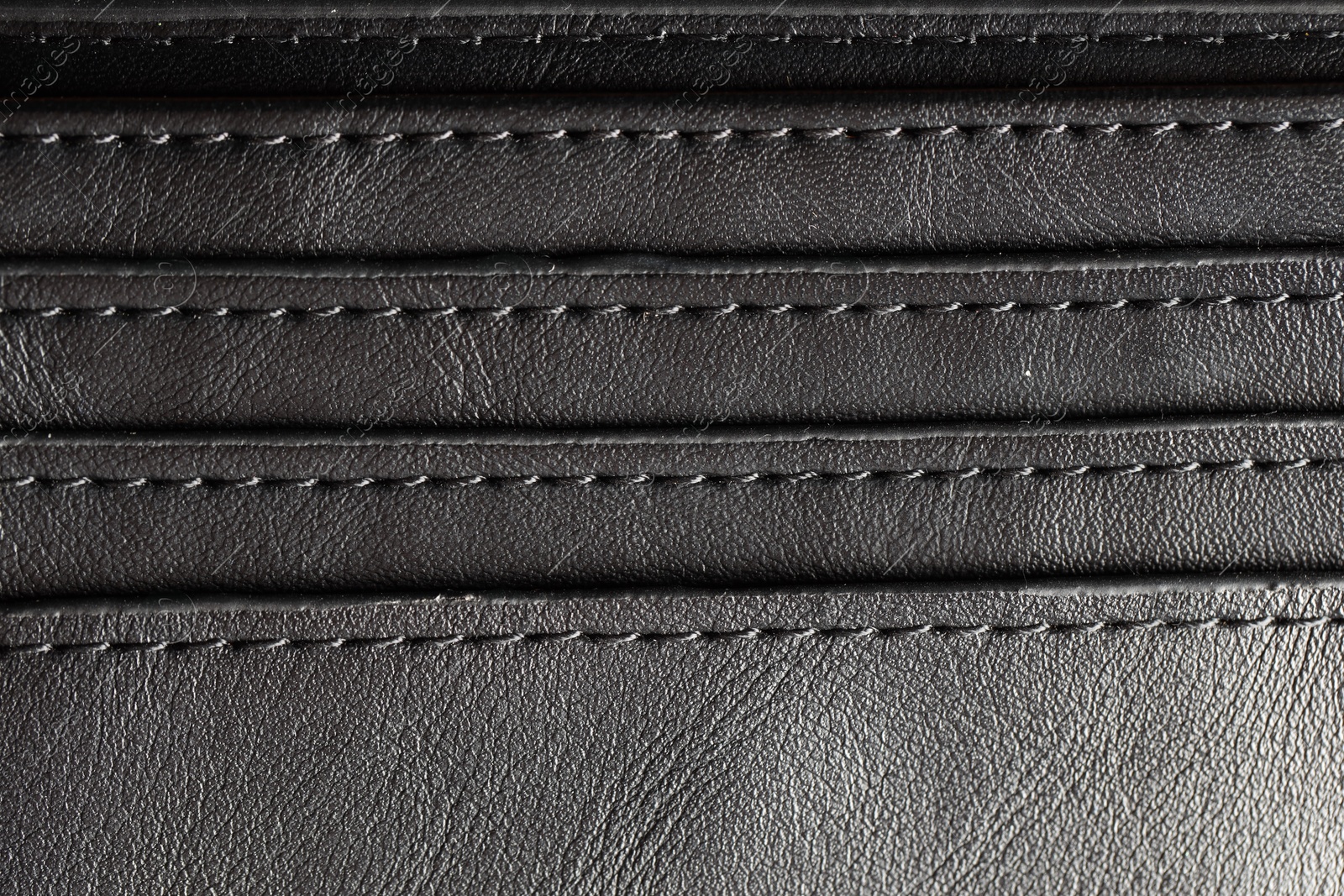 Photo of Texture of natural leather as background, top view