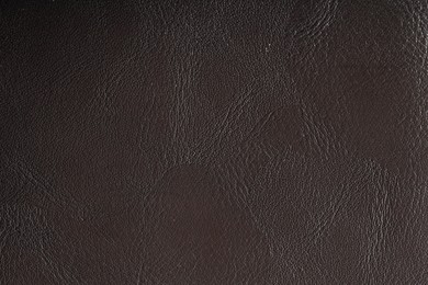 Photo of Texture of natural leather as background, top view