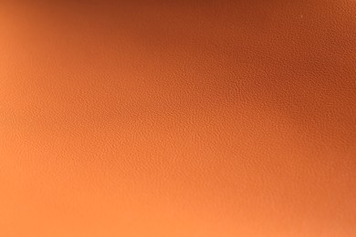 Photo of Texture of natural leather as background, closeup