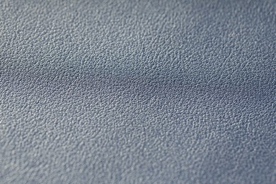 Photo of Texture of natural leather as background, closeup