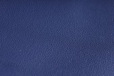 Photo of Texture of natural leather as background, closeup