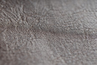 Photo of Texture of natural leather as background, closeup