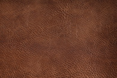 Photo of Texture of natural leather as background, closeup