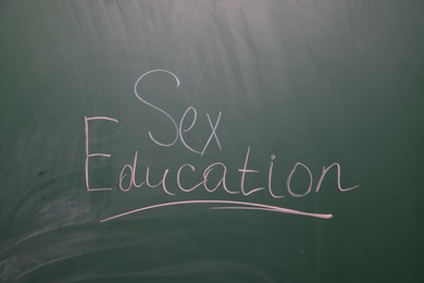 Photo of Words Sex Education written on green chalkboard