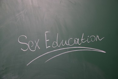 Photo of Words Sex Education written on green chalkboard