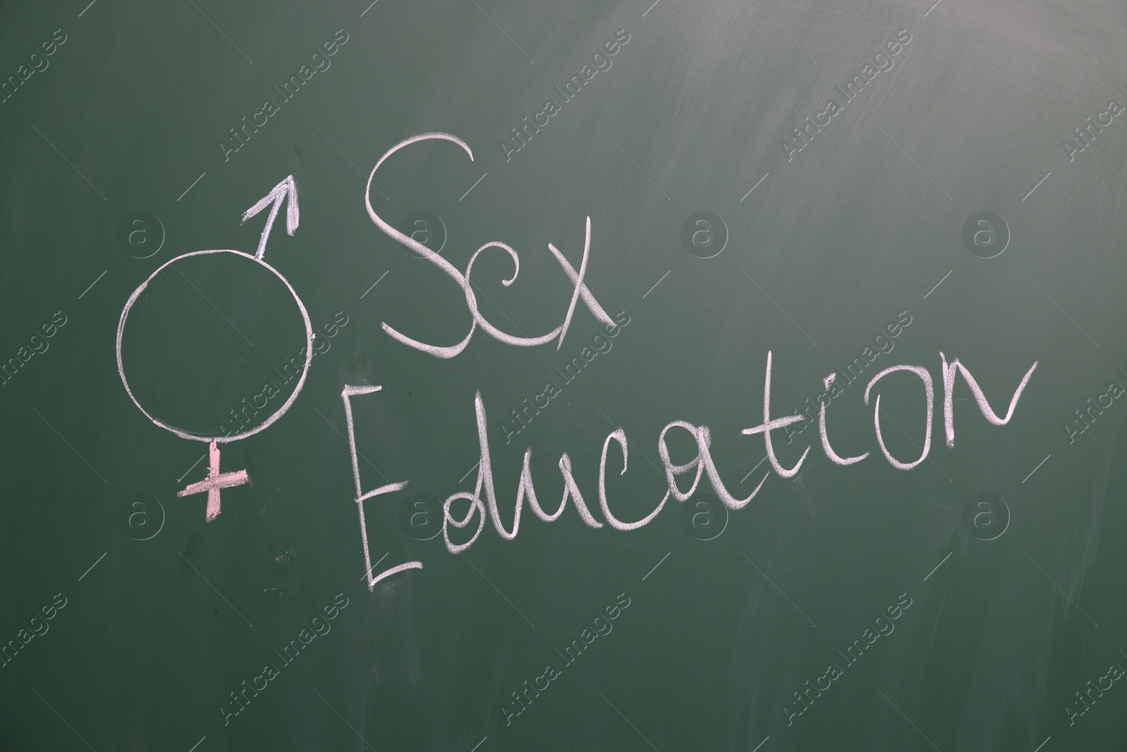 Words Sex Education and gender symbol on green chalkboard Photo of Words Sex Education and gender symbol on green chalkboard