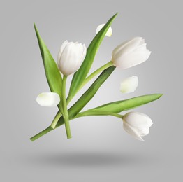 Image of Beautiful white tulip flowers and petals in air against grey gradient background