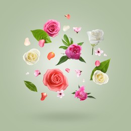 Image of Beautiful flowers and petals in air against green grey gradient background