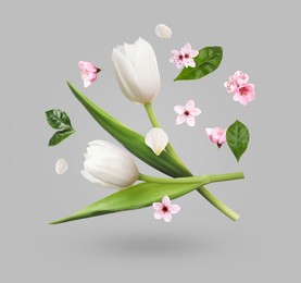 Image of Beautiful flowers, petals and green leaves in air against grey background