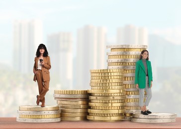 Image of Business women on stacked coins. Different income